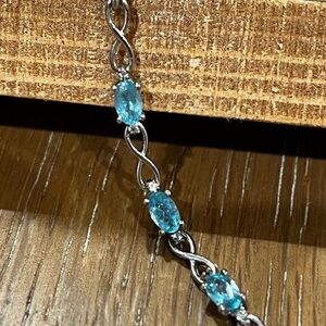 Elegant 8 Inch 925 Silver and Blue Topaz Women's Tennis Bracelet
